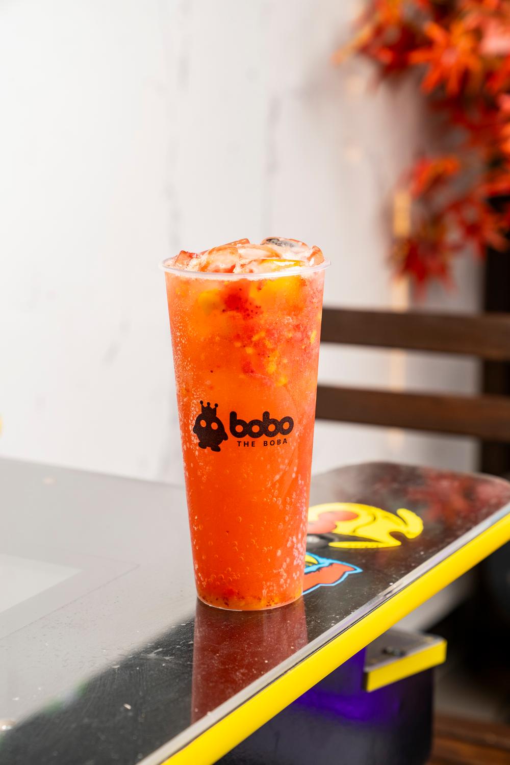 Strawberry mango fizz with fresh fruit